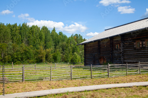 Rural Wooden Houses in Summer Countryside
