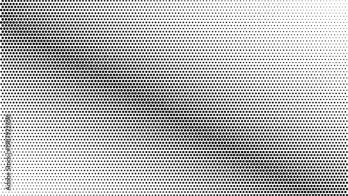 A diagonal gradient of black dots transforms from sparse to dense across a clear white surface