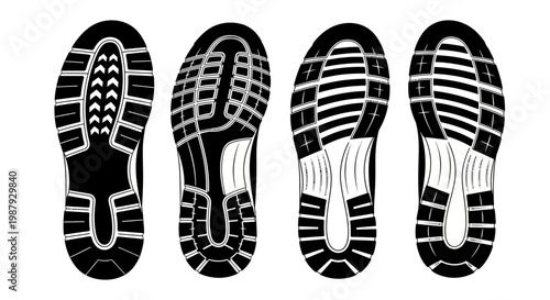 Detailed Perspective of Four Athletic Shoe Soles in Black and White Formation