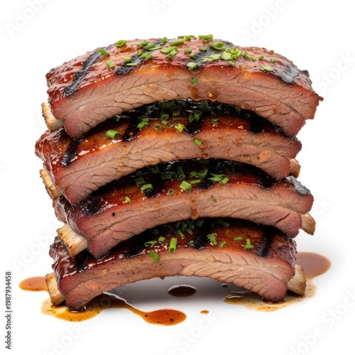 A mouthwatering stack of barbecue ribs with a rich and savory sauce