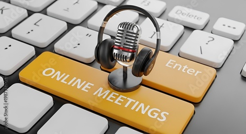 Online meeting concept with microphone and headphones on keyboard