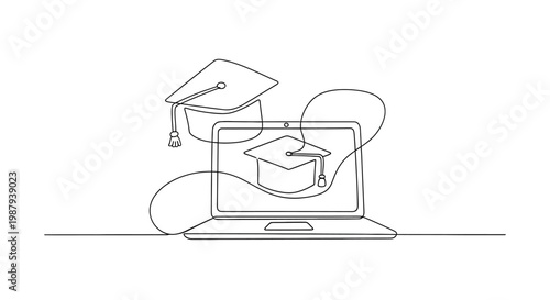 Online Education Concept: Laptop with Graduation Caps - Digital Learning and E-learning