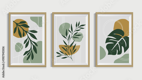 A set of three framed prints featuring stylized botanical illustrations of green and gold leaves on a white background, perfect for interior design, home decor, or art enthusiasts.