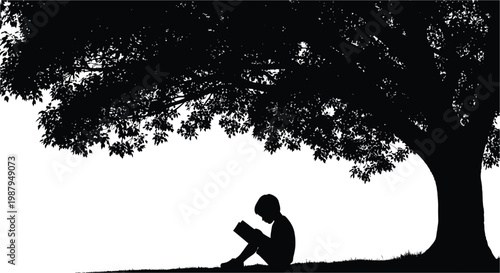 A silhouetted child reading a book beneath a large tree outdoors