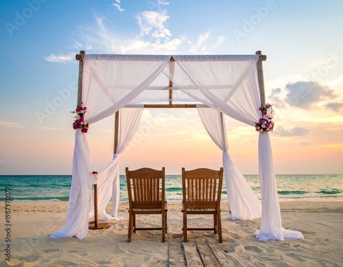 Romantic Beach Wedding Altar with White Draping, Floral Decor, and Wooden Chairs at Sunset Coast