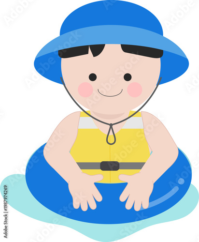 튜브를 타고 있는 귀여운 소년