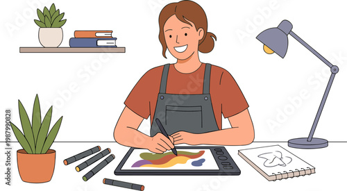 Woman sitting at desk drawing on digital tablet with pencils and notebook