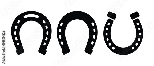 Three black horseshoes on a white background