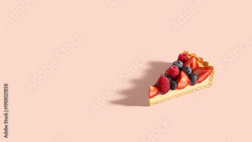 Single Slice of Berry Tart on Pastel Pink Background with Large Copy Space for Elegant Mother’s Day Greeting

