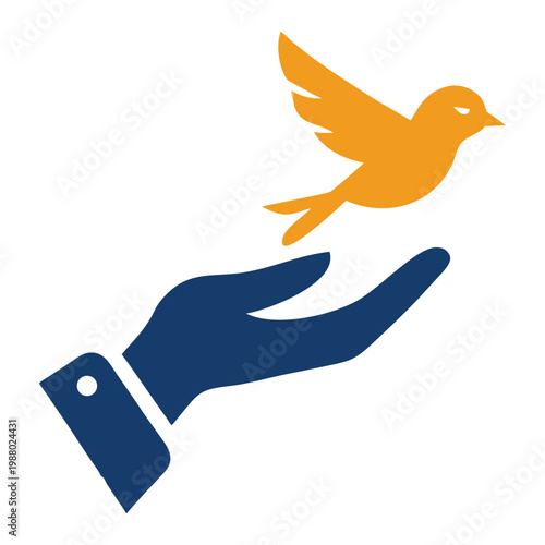 Hand releasing a bird into the sky, concept for freedom, hope, peace, charity, nature, and new beginnings.