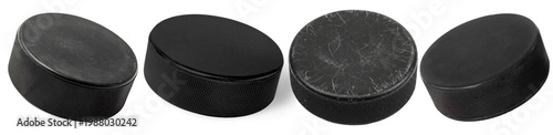 Photography Multiple black ice hockey pucks showcasing various angles, isolated on a transparent background for sports design