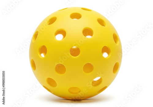 A yellow pickleballs with holes on a white background