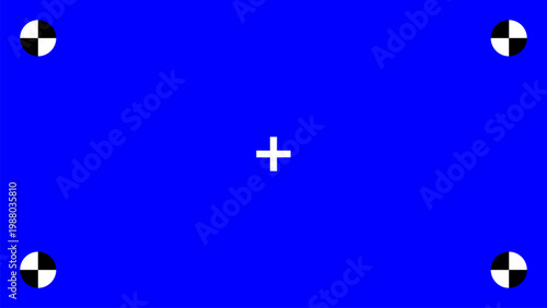 Blue screen with chroma key tracking points for visual effects compositing work