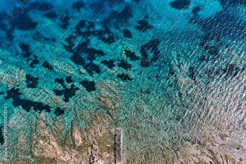 Tableau sur toile Le acque cristalline nellì aria marina di punta Molara, Sardegna.
