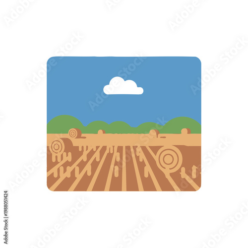 Countryside farm field with hay bales under a blue sky with cloud