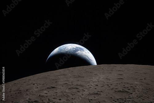Earth rising from behind the moon during the Artemis II spaceflight (Elements of this image furnished by NASA)