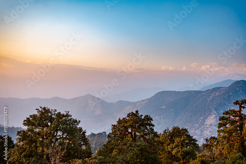 Photography A serene mountain landscape at sunset near Tungnath temple, Uttarakhand, India