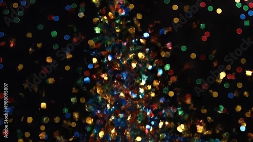 Colorful abstract bokeh lights on dark black background