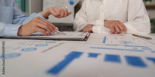 Принти на полотні Team collaboration on financial data and reports