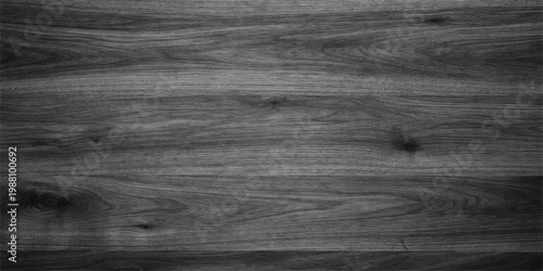 Old black and white wood texture background featuring a dark weathered plank pattern with natural grain on a rough timber board surface