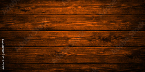 A weathered brown wooden plank surface featuring a natural rough timber pattern and old hardwood texture makes an ideal rustic backdrop or material for a floor and wall