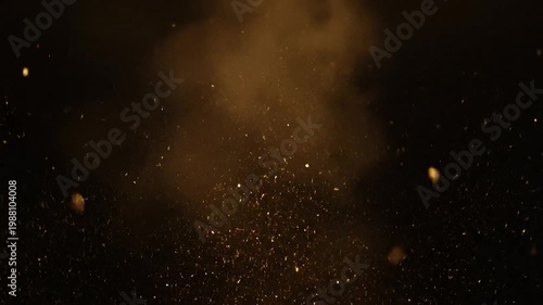 Golden particles floating in space.