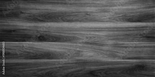 A dark black and white landscape captures the textured grain of an old oak wood board and natural timber surface pattern