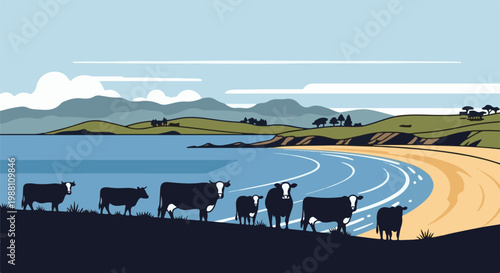 Herd of cows graze near a tranquil blue bay with sandy shores