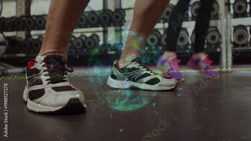 Two partners shifting and tapping right foot, grabbing med ball, orb overlay syncing for training