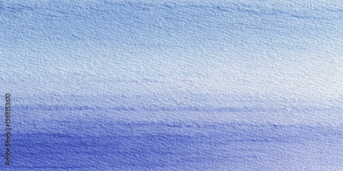 A bright closeup of a clean blue cotton towel fabric texture shows a soft material surface with a patterned design reminiscent of cold winter snow or clear sea water