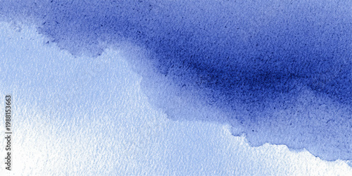 Abstract blue watercolor background with a cold winter texture of frozen ice and paint splashes on a grunge paper surface design