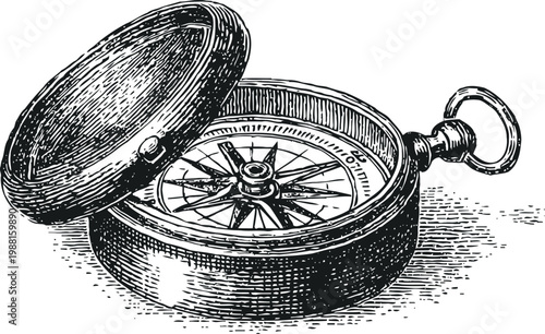 Vintage compass with open lid showing detailed directional needle and engraved markings