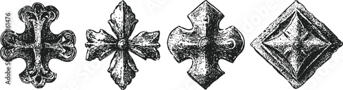 ornate vintage metal crosses and decorative studs with intricate engravings and antique texture