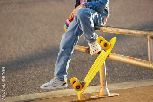 Cool little boy with skateb...