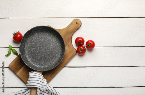 Frying pan with tomatoes an...