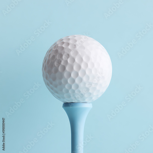 A white golf ball with dimples sits on a light blue tee against a matching background