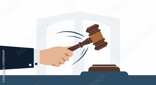 Hand holding a gavel and striking a block, in a courtroom setting