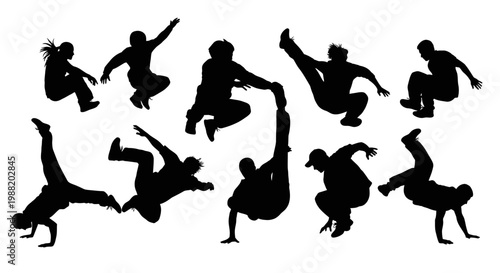 Dynamic Silhouette Dancers In Action, A Display Of Movement And Artistic Expression