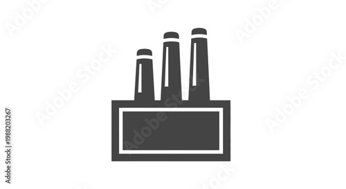 Industrial factory building with smokestacks.