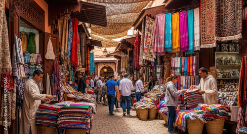 People shopping colorful textiles in a busy marketplace