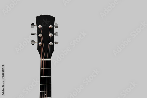 Modern black guitar on grey...