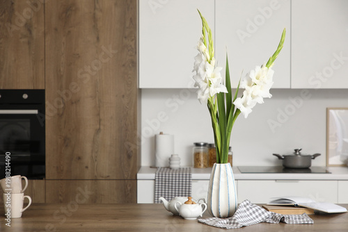Vase with gladiolus flowers...