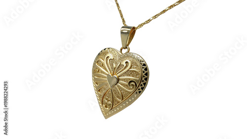 Принти на полотні Gold heart pendant with detailed design hanging from a simple chain viewed on a