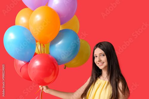 Happy teenage girl with col...