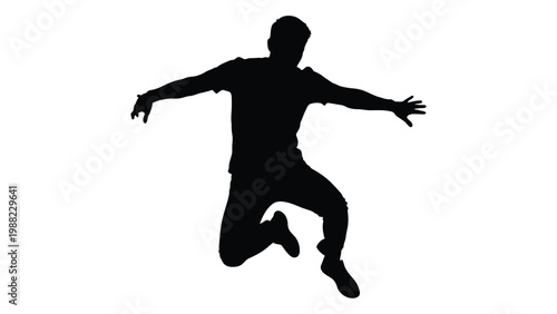 A silhouette of a man mid air actively jumping with arms outstretched