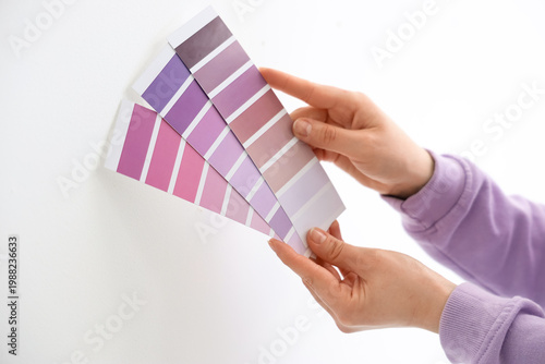 Female hands with violet pa...