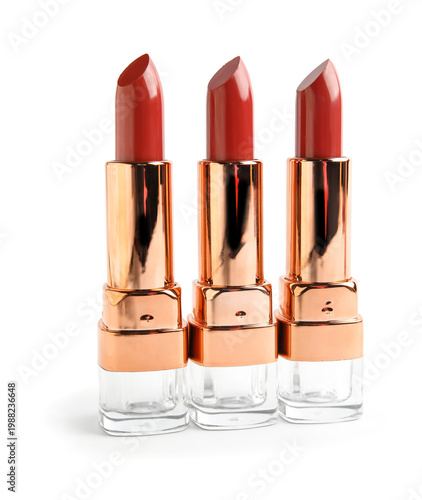 Set of red lipsticks on whi...