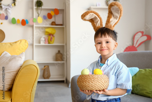 Cute little boy in bunny ea...