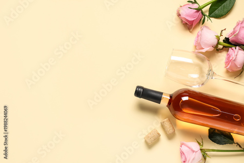 Bottle of pink wine with gl...