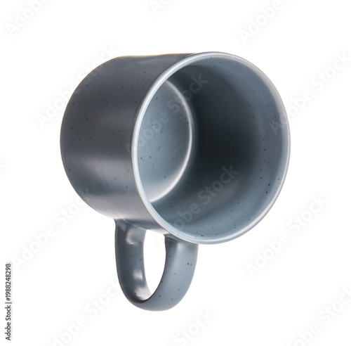 Empty grey ceramic mug on w...